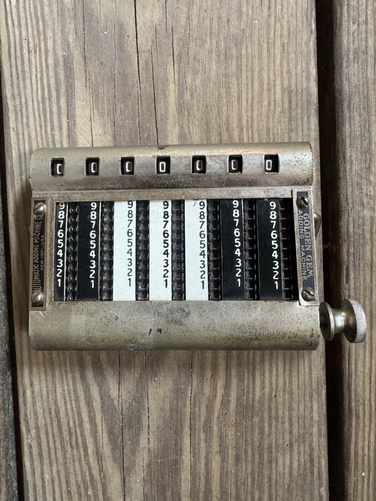 Early 1900’s Golden Gem Adding Machine