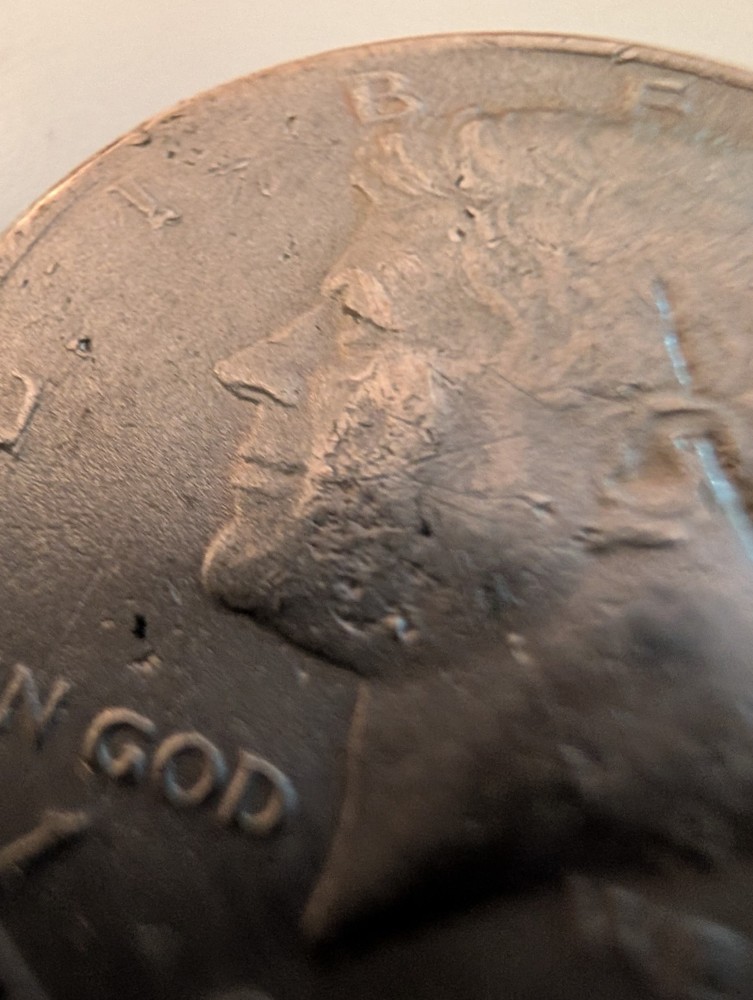 1971 Half Dollar Struck Through Wire And Error On His Cheek