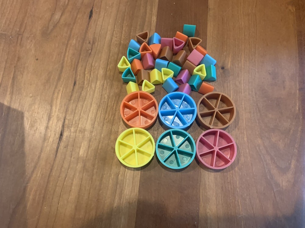 trival pursuit game pieces