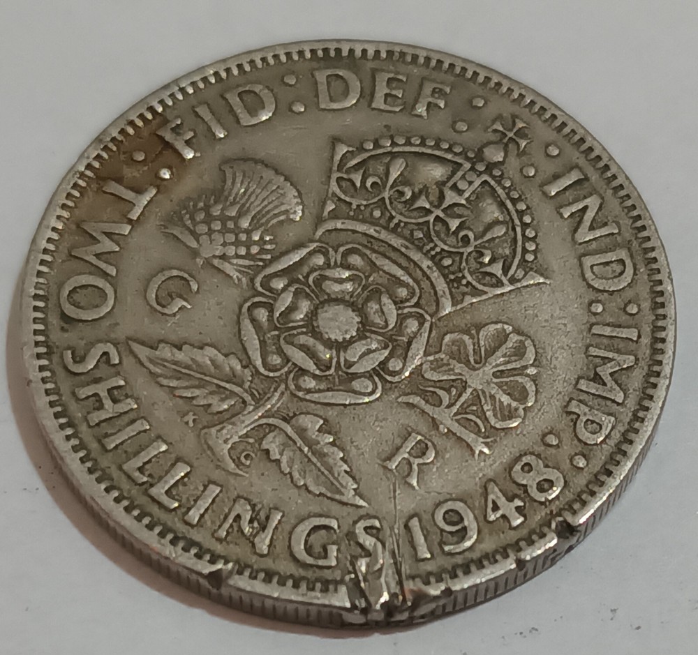 George V and George VI coins with error
