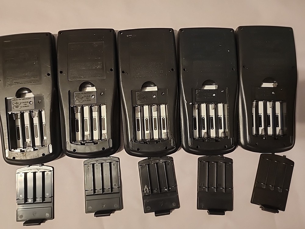5 - Broken Texas Instruments TI-83 Plus Graphing Calculators - No Covers