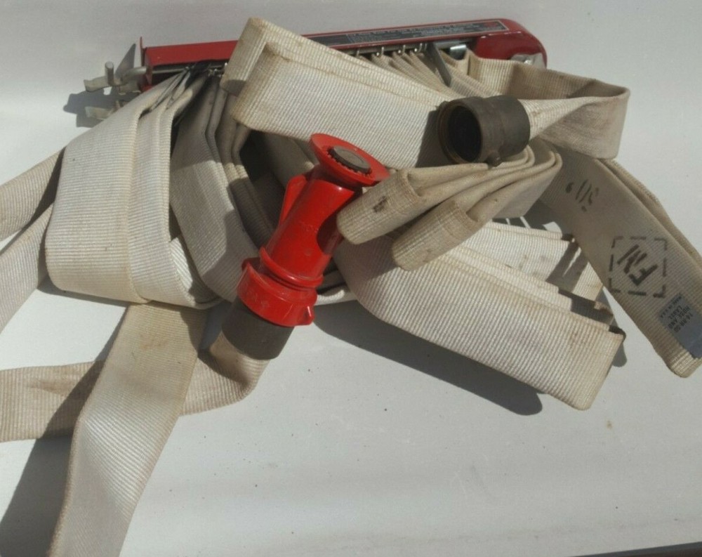 F-M Fireman Hose Rack with Fire Hose.