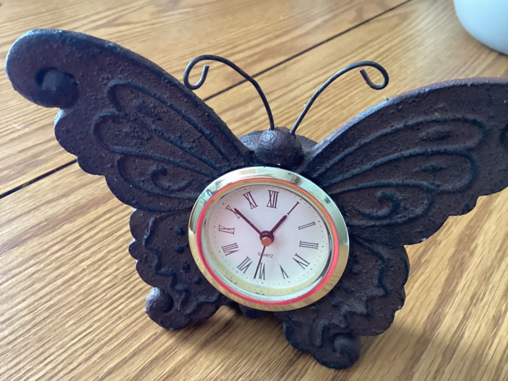 Butterfly shape collectible in good condition. Clock on this piece does not work