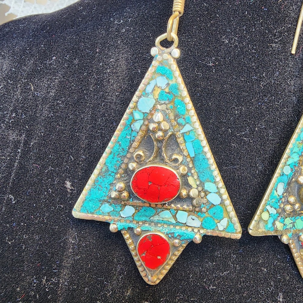 Triangle-shaped dangle earrings featuring mosaic-style turquoise