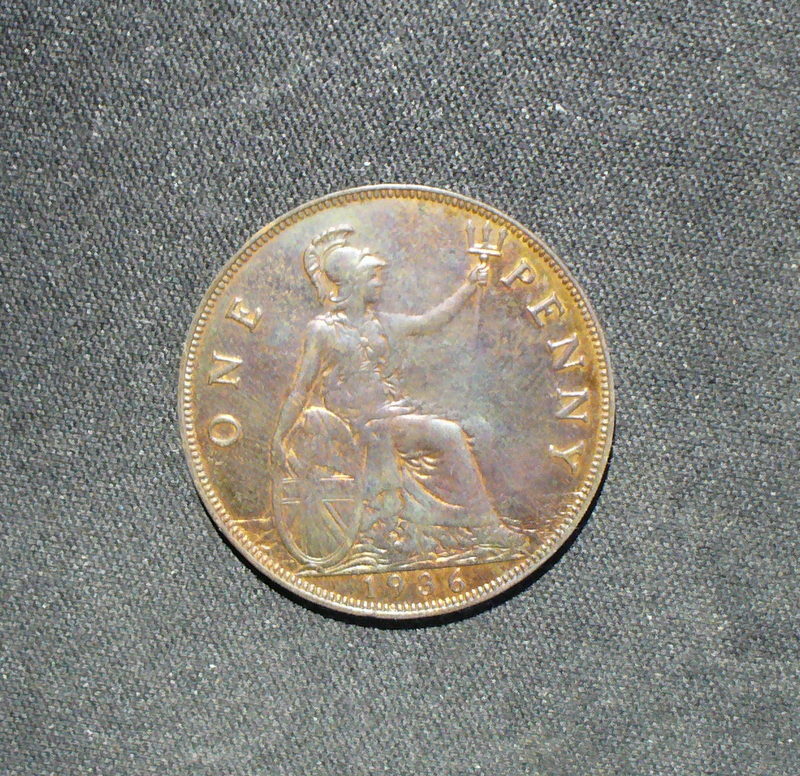 Two Old UK Pennies