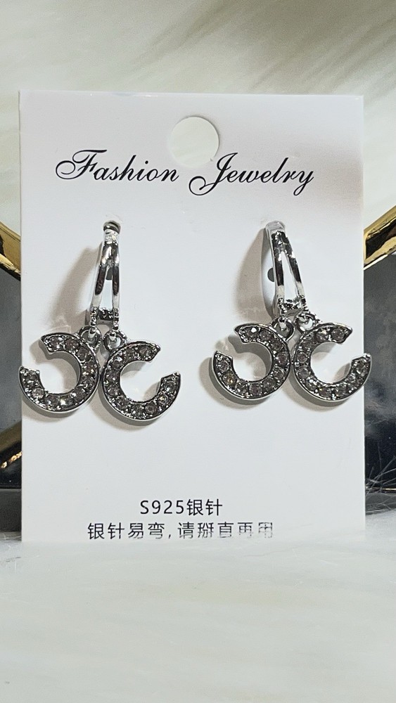 LUXURY STERLING SILVER EARRINGS .