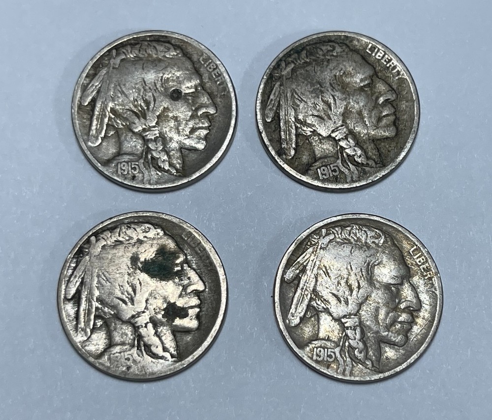 Four 1915 Buff. Nickels (#10137) All with probs.