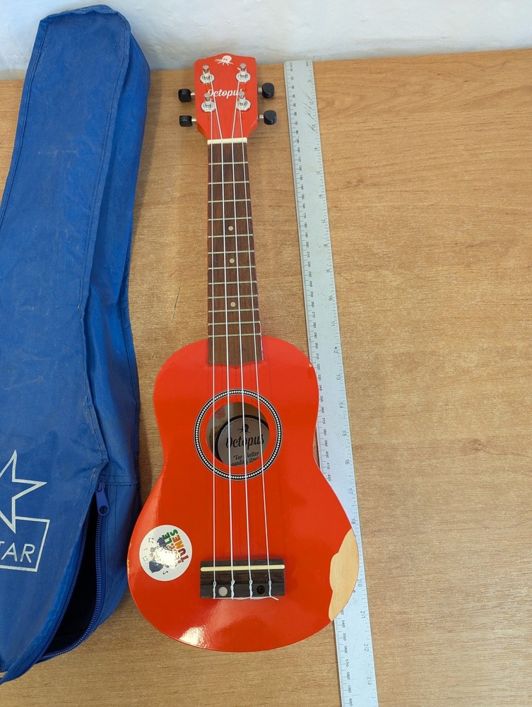 Octopus Soprano Ukulele Red with 4 Strings Includes Case for Beginners
