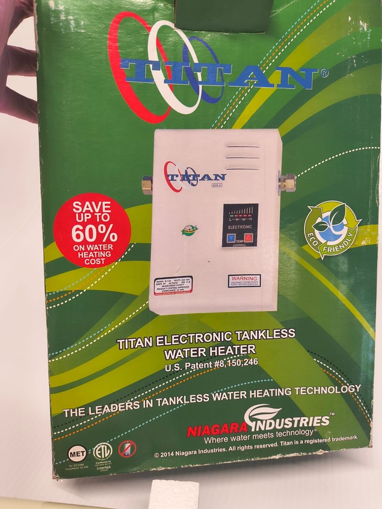 Titan Electronic Tankless Water Heater Model N-64 VOLTS 277 AMPS 25 OPEN BOX
