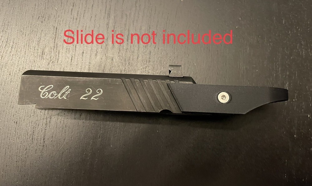 Colt Model 22 finger loop charger, slide racker.