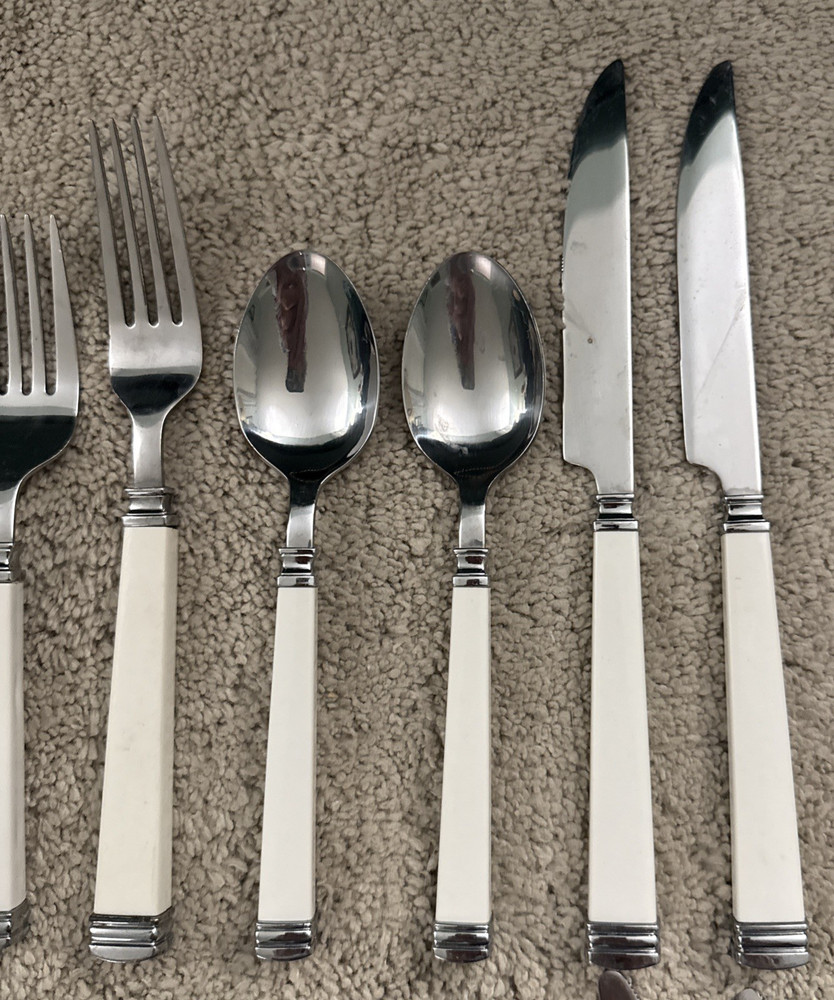 Assorted 17-pc White Plastic Handle Stainless Flatware, China, Taiwan