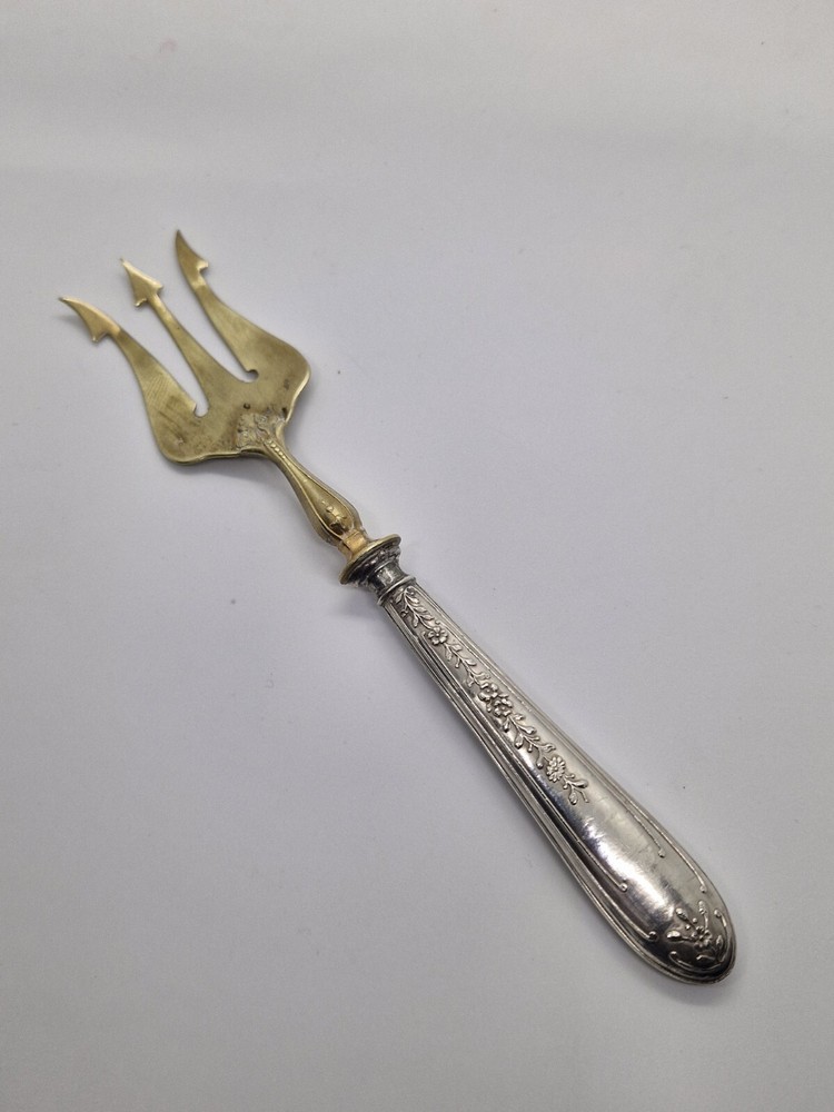 Vintage Antique brass fork with silver handle
