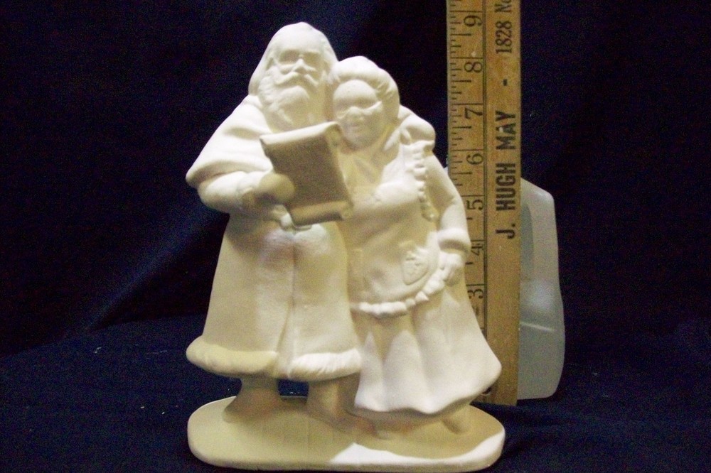 ceramic bisque ready to paint Mr/Ms Santa Singing