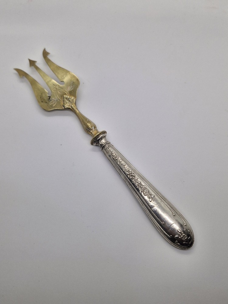 Vintage Antique brass fork with silver handle