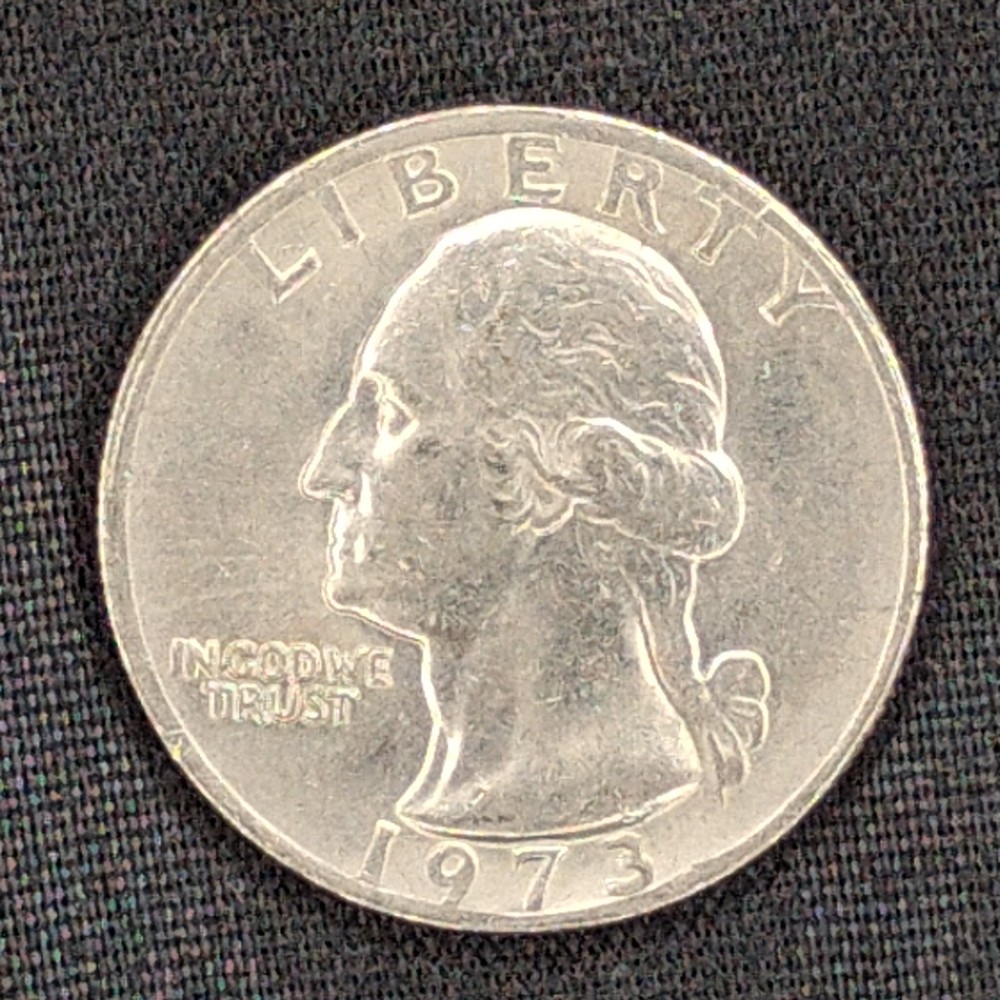 1973 Washington Clad Quarter Double Edge Error Obverse