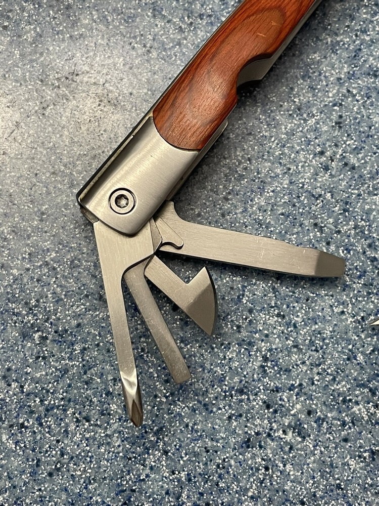 Elk Ridge-Multi Tool With Assorted Tools -pliers -knife-sockets- Bottle Opener