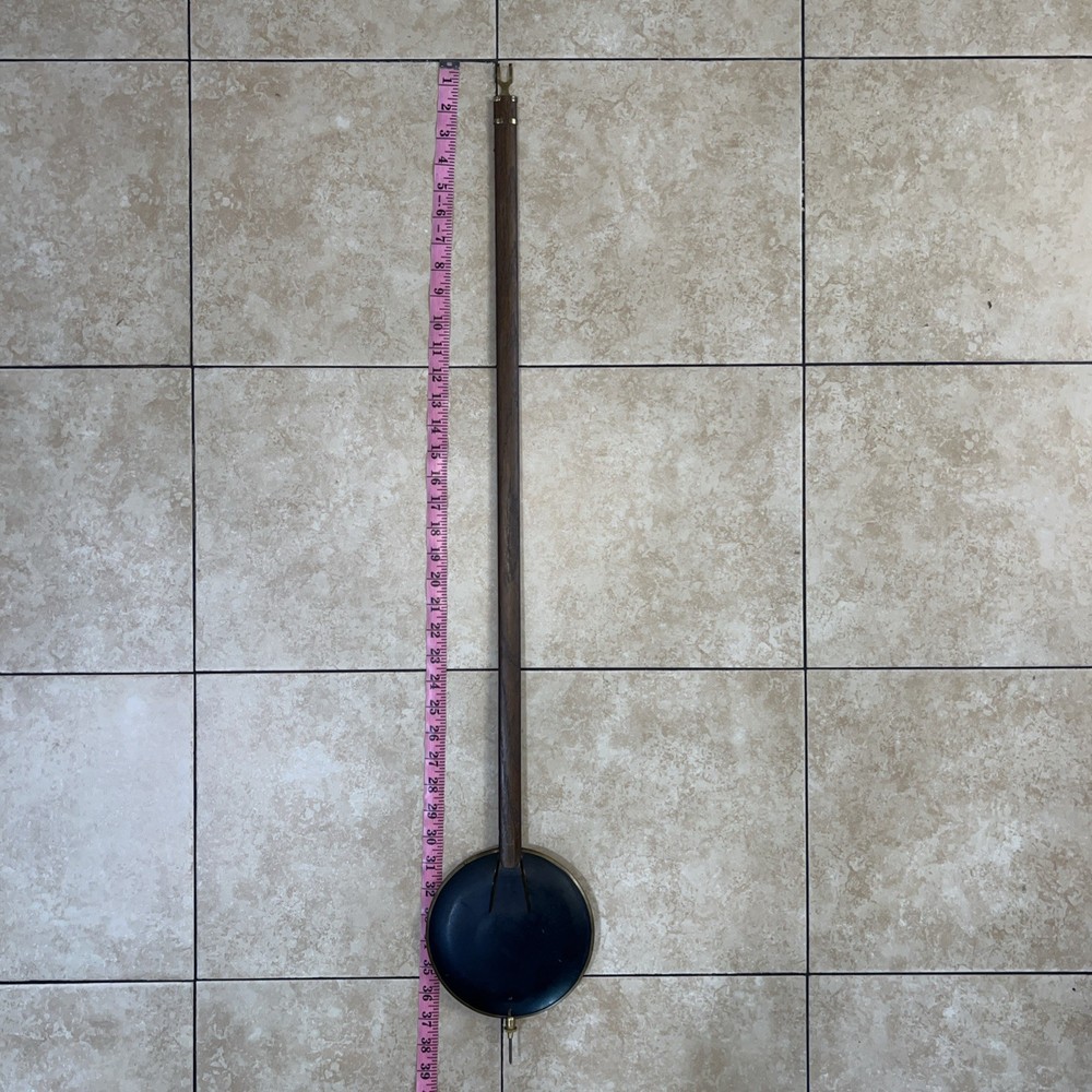 Junghans vintage grandfather clock pendulum.