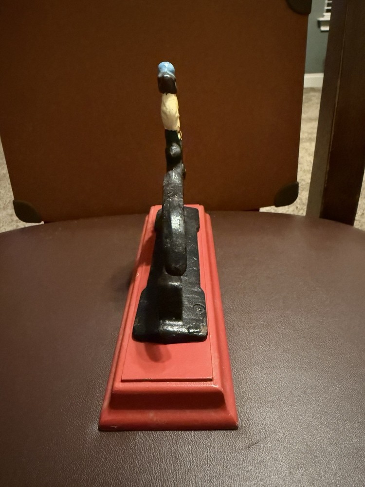 Vintage Heavy Cast Iron Nut Cracker On Red Wood Base Nutcracker Soldier