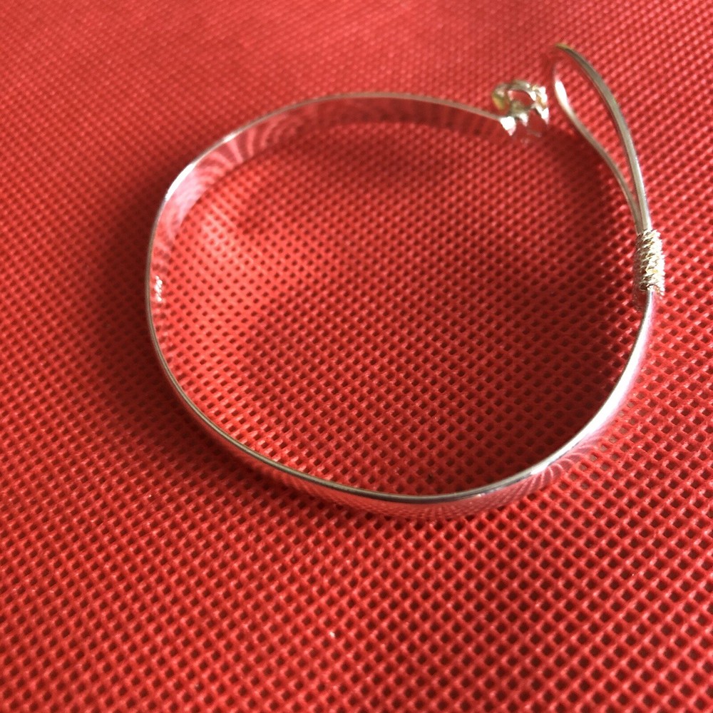 Silver Bangle With A Rose Fixture