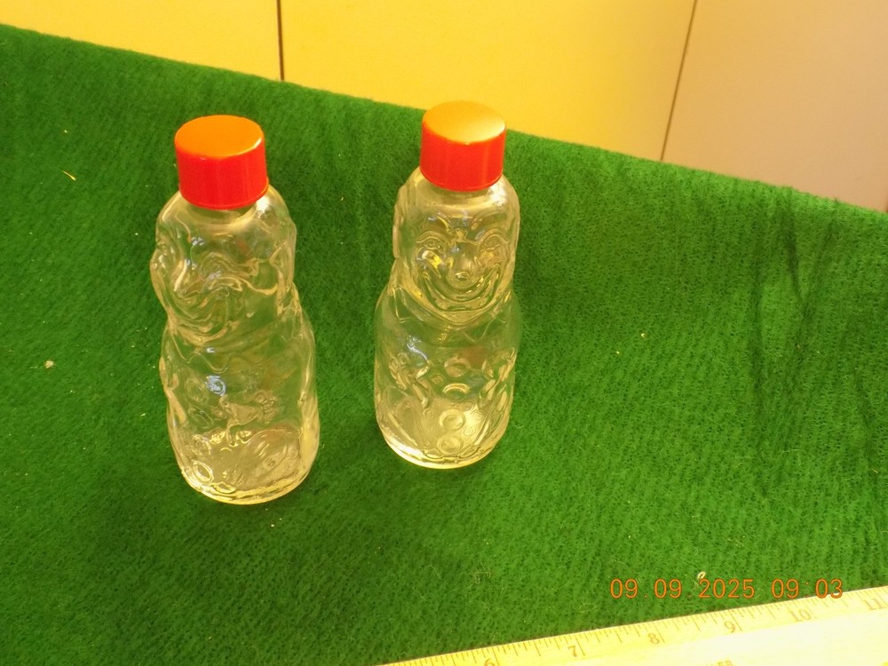 Vintage clear glass clown empty candy containers