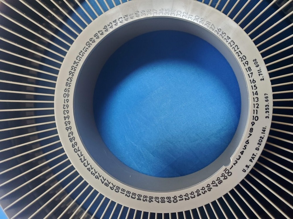 Two 1960's Montgomery Ward 100 Slide Wheel Trays 67-3473