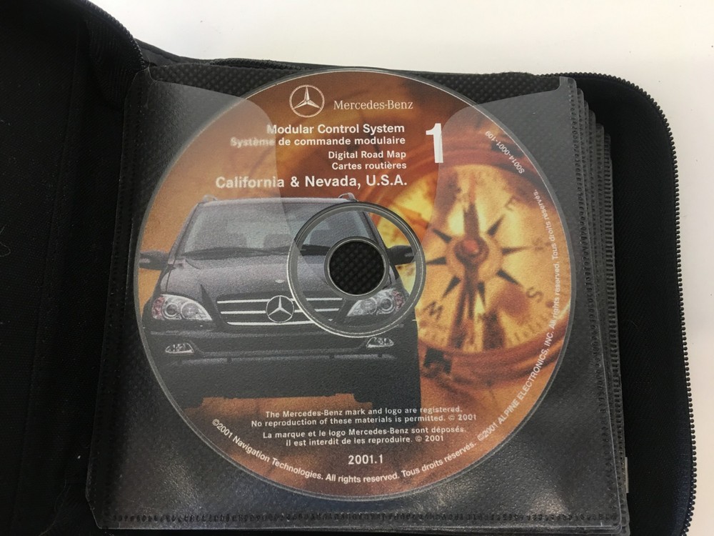 MERCEDES 20 DISC CD FOLDER MAGAZINE CD STORAGE ACCESSORY BOX W/NAVIGATION CD