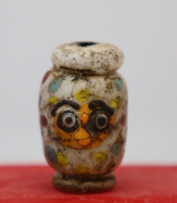Ancient roman face bead
