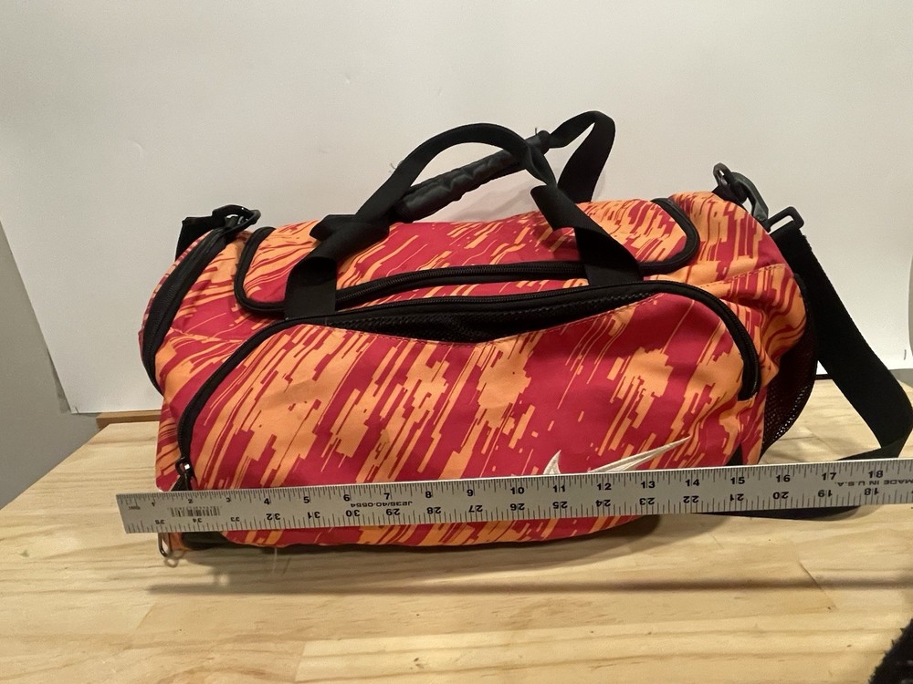 Nike Duffel Bag in an Orange Red Checkered Pattern- 16 X 9