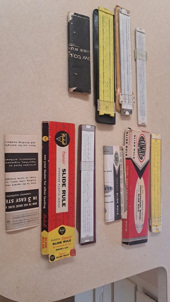 5 vintage slide rules.  PICKETT  AND ACUMATH