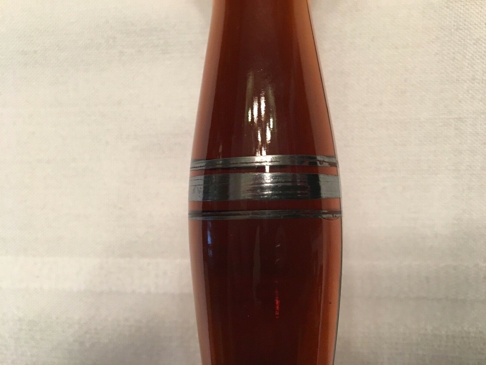 Antique amber candle stick with sterling silver applica