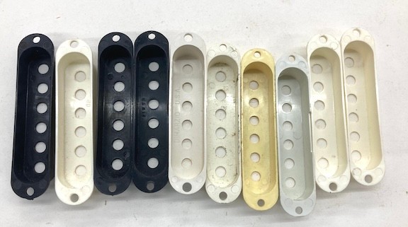 10 plastic Stratocaster pickup covers unknown makers