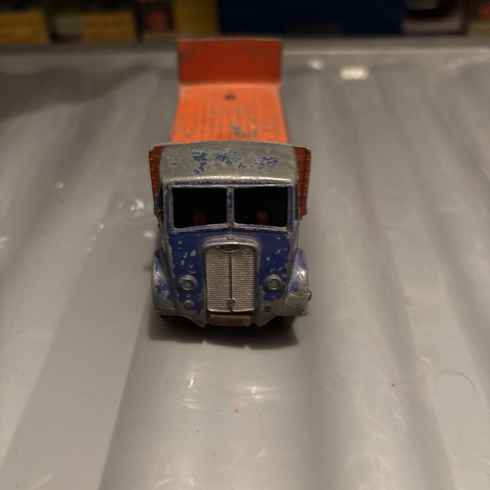 DINKY  GUY FLATBED with  tailboard 1950s. orange & blue