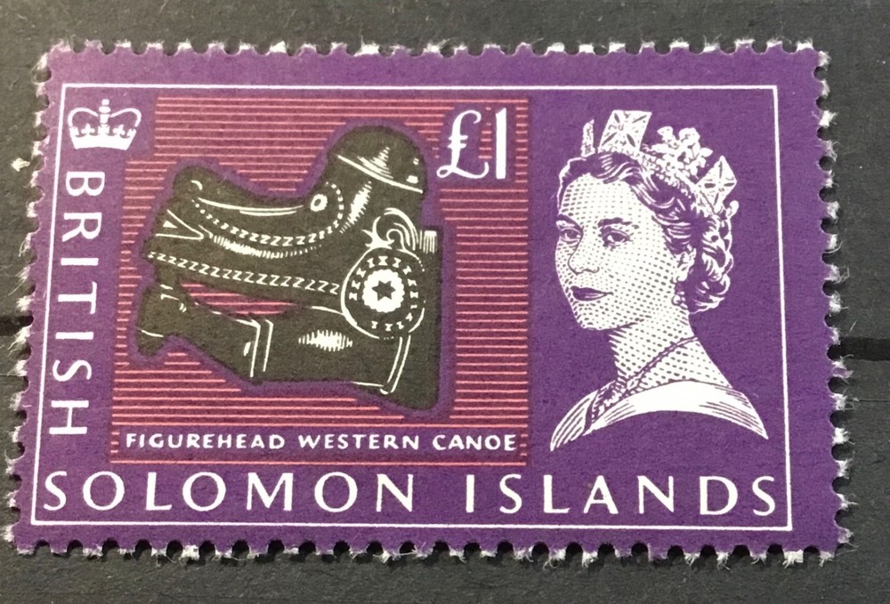SOLOMON ISLANDS #142. QE II & FIGUREHEAD CANOE. MLH
