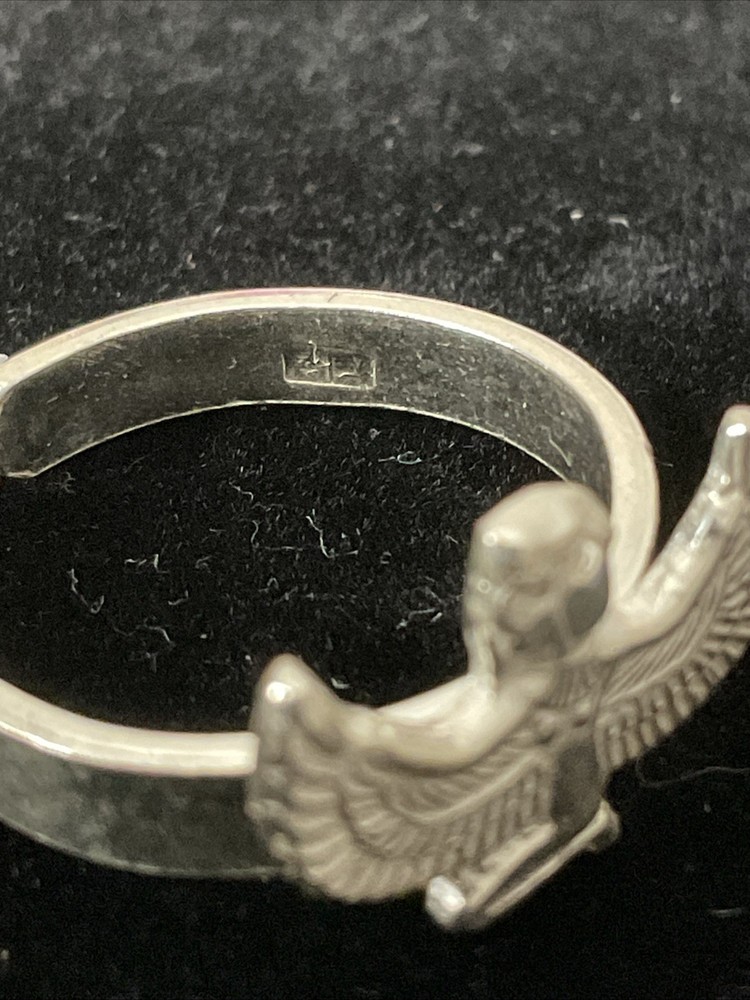 An elegant and modern silver ring featuring the goddess, Isis. Adjustable