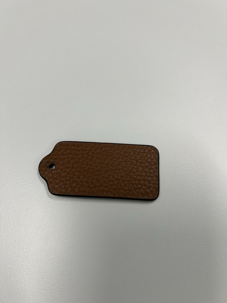 coach british tan Textured hang tag