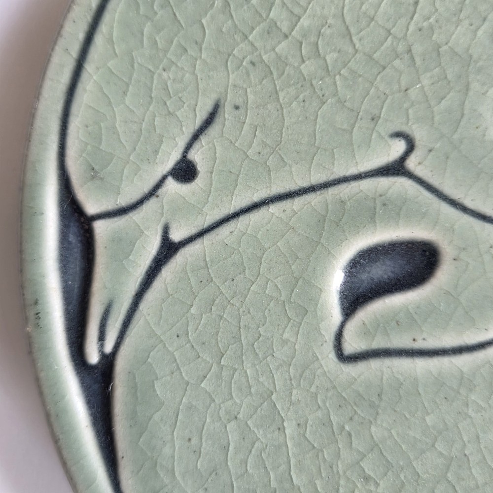 MCM Signed Sullivans Two Intertwined Dolphins 6" Celadon Round Tile Trivet