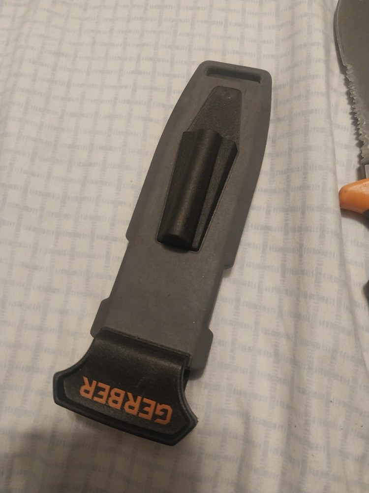 Gerber Bear Grylls Ultimate Survival Knife with firestarter.