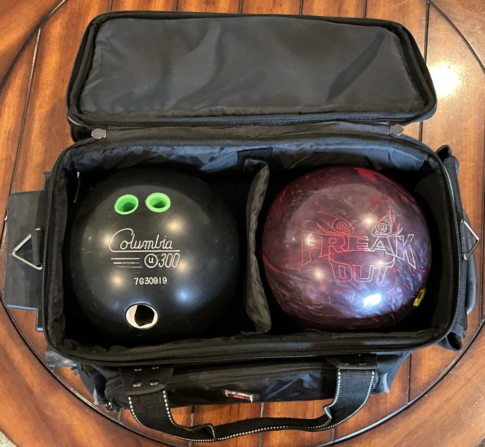 2 Bowling Balls And Roller Carry Case