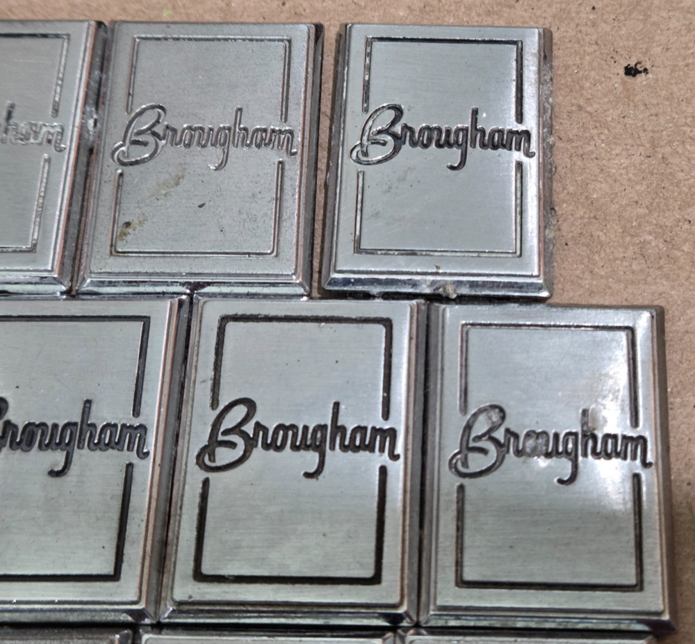 (2) OLDSMOBILE BROUGHAM CIRCA '80S SAIL PANEL EMBLEMS 1" (5604}