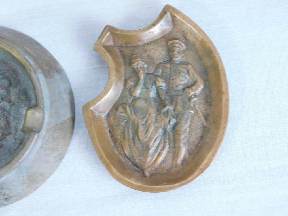 Two Early 20th C. Solid Brass Ashtrays - US Eagle Shield & Naughty Officer