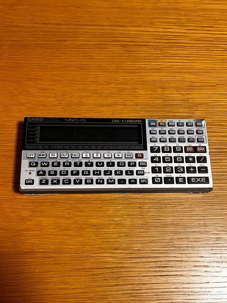 CASIO VX-4 mini Pocket Personal Computer Calculator Tested AA Battery Replaced.