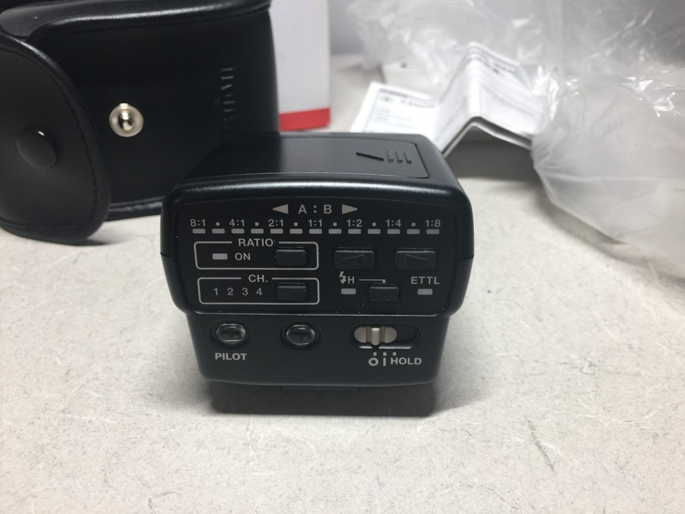 Canon Speedlite Transmitter ST-E2 manual EOS accessory shoe mount flash trigger