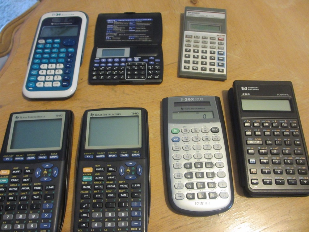 7 Calculators - Scientific - HP - Sharp - Texas Instruments - TI . quantity 7