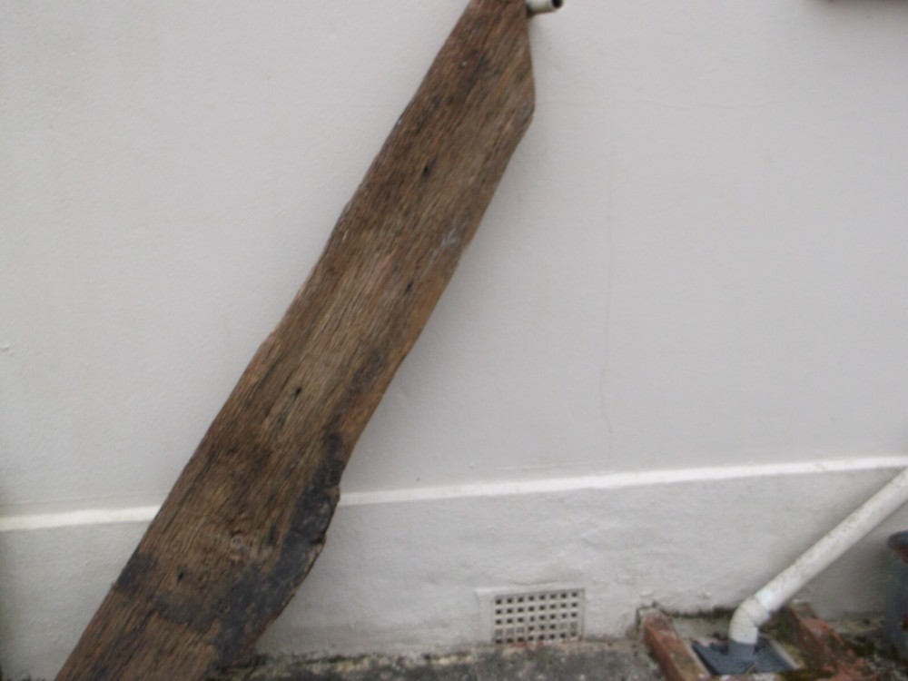 Structural solid Oak Bracing section from C17th cottage with peg hole etc