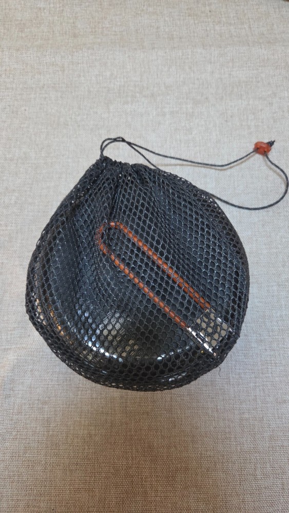 Five piece mess kit with stuff sack. Used a few nights camping.