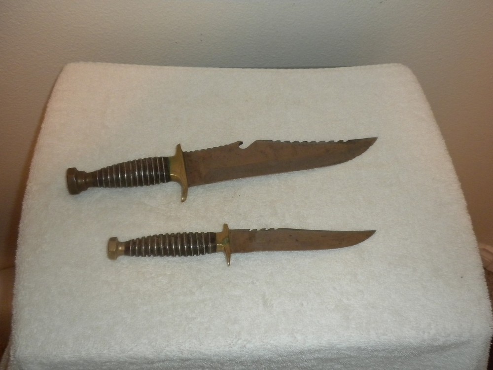 TWO KNIVES SAME DESIGN WITH LEATHER HOLDER