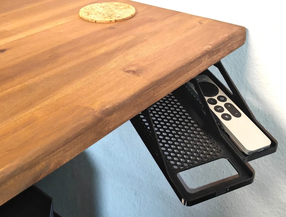 Smartphone/remote holder for desktop