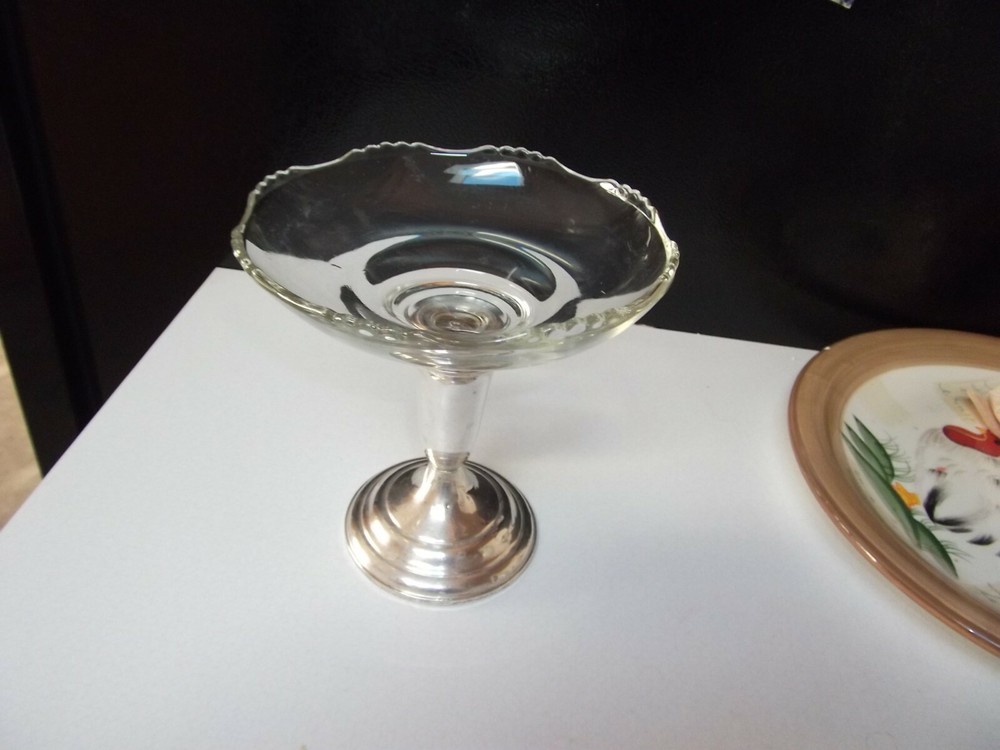 Empire sterling weighted dish 6 1/4" tall.