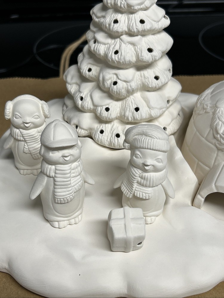 Penguins with lighted tree and igloo set ceramic bisque paint, 7 Pieces