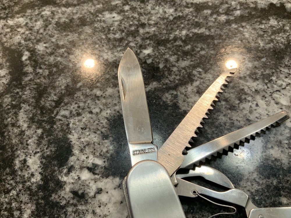 Pre Owned Pocket knife Army style 8 function Multi Tool used nice